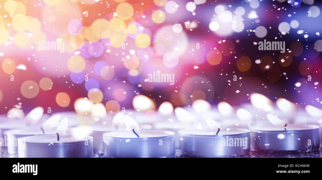 Burning tealight candles during Christmas time Stock Photo Alamy