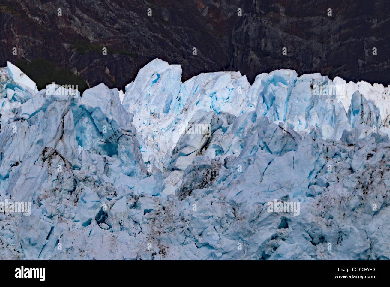 When the ice on the glaciers of Glacier Bay National Park and Preserve calve, it echoes down the channel like thunder in a very impressive display Stock Photo
