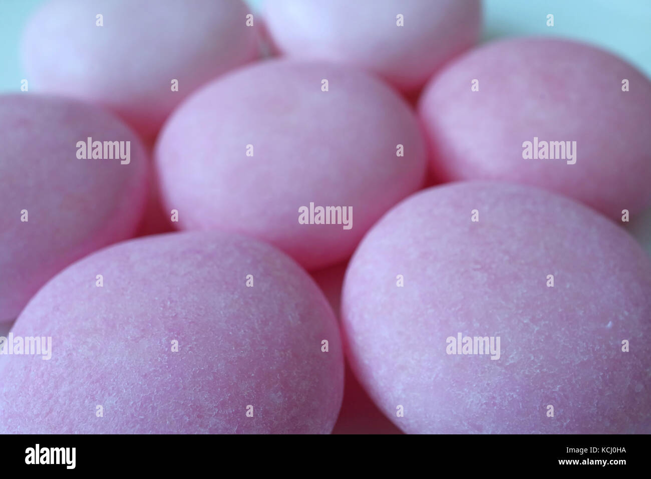 Lined up Pastel Purple Sugar Coated Round Candies, Macro Shot for