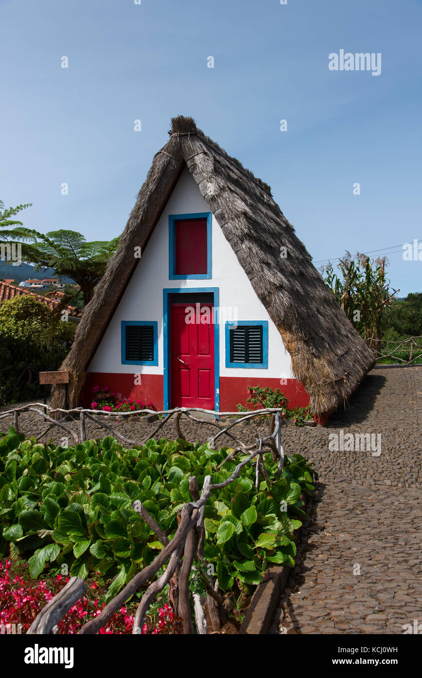 Located in Santana on the North East Coast of Madeira, these traditional A Framed Thatched houses are preserved for the tourist industry Stock Photo