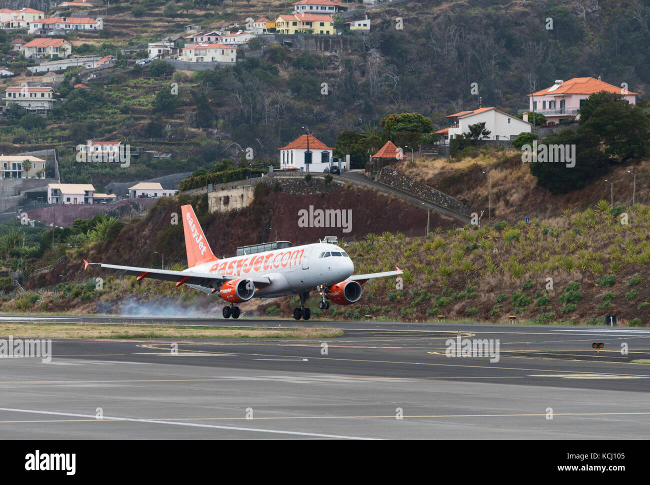 Easyjet Airbus A319 Registration G-EZBD touches down at Cristiano Ronaldo International Airport in Madeira Stock Photo