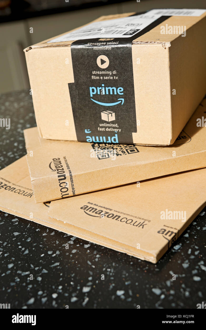 Close up of Amazon prime packages package box boxes home deliveries internet shopping delivery England UK United Kingdom GB Great Britain Stock Photo