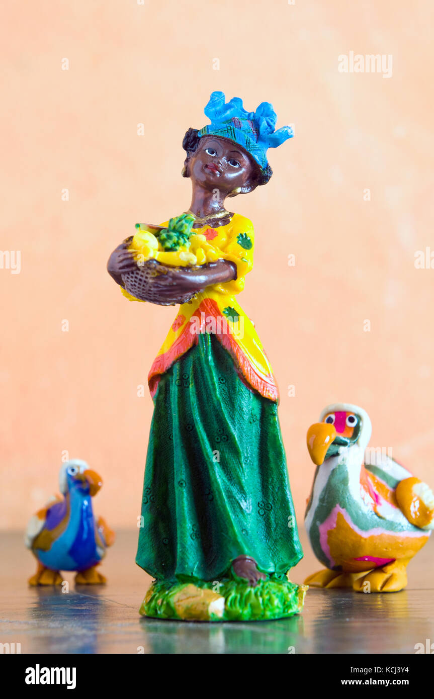 Model of Mauritian woman in traditional costume with dodos, Port Louis, Mauritius Stock Photo