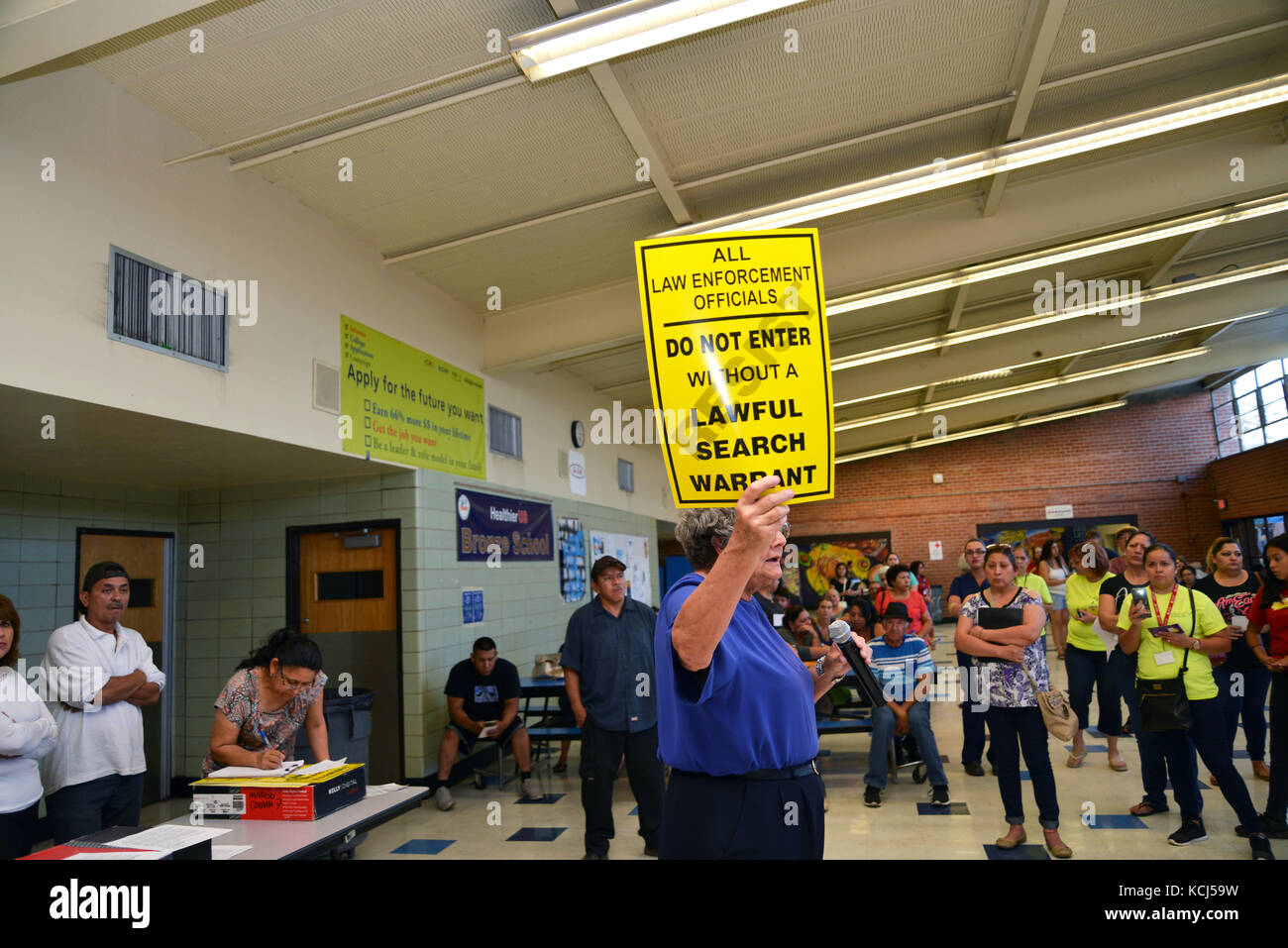 Volunteers from Keep Tucson Together and attorney Margo Cowan provide legal assistance to