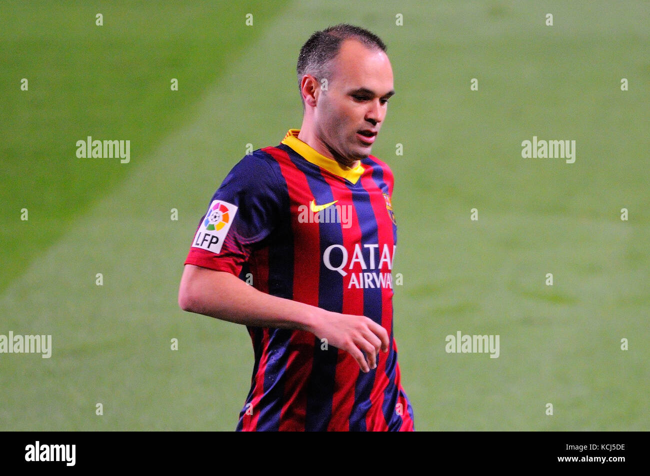 BARCELONA - APR 21: Andres Iniesta, F.C Barcelona player plays, at the Camp Nou Stadium on the Spanish League on April 21, 2014 in Barcelona, Spain. Stock Photo