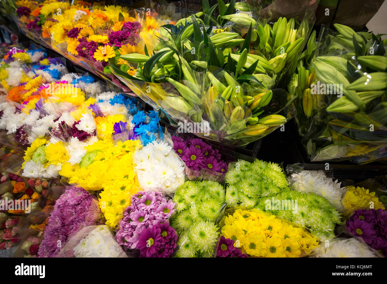 bunches of flowers for sale in a supermarket Stock Photo