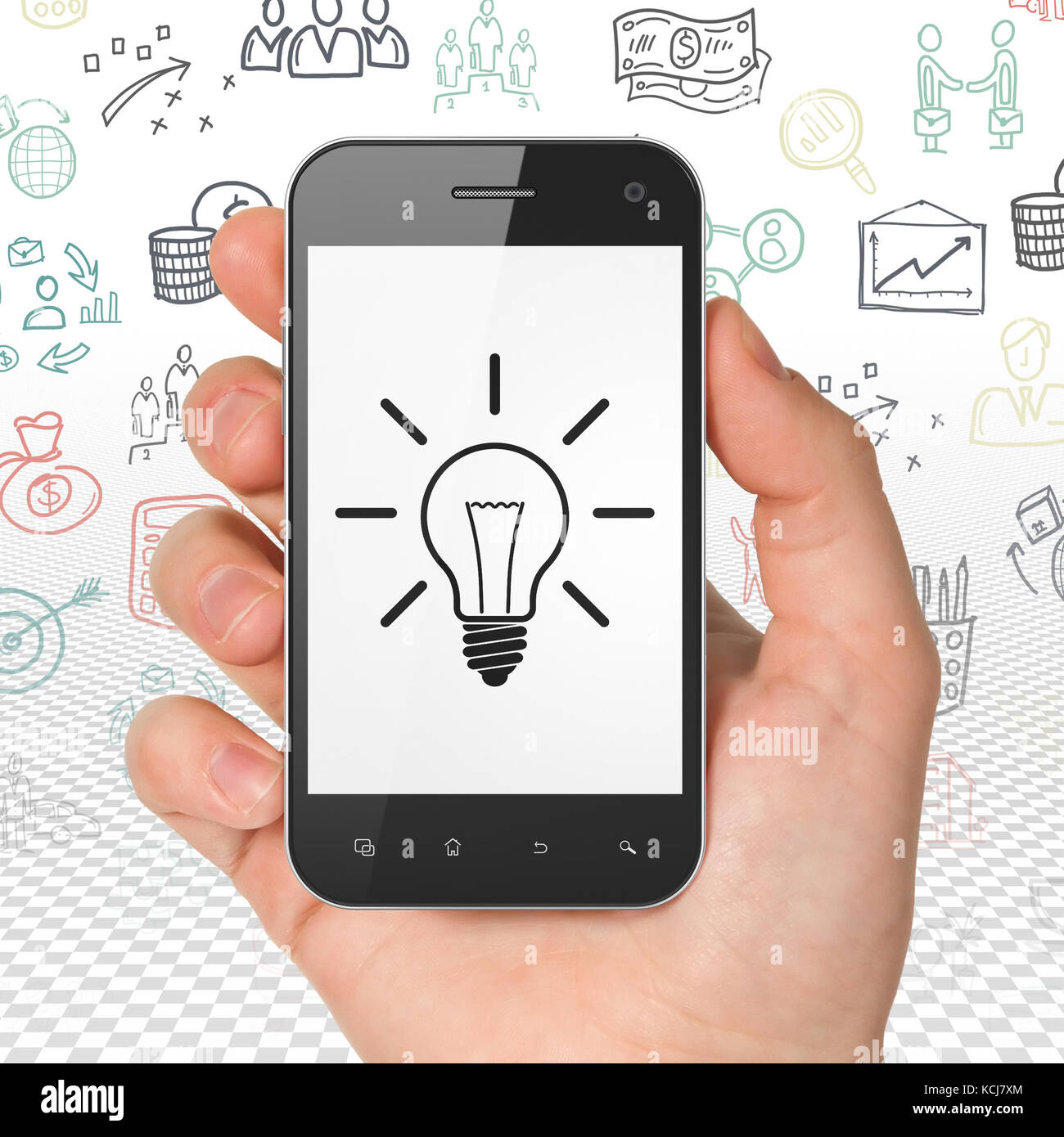Business concept: Hand Holding Smartphone with Light Bulb on display ...