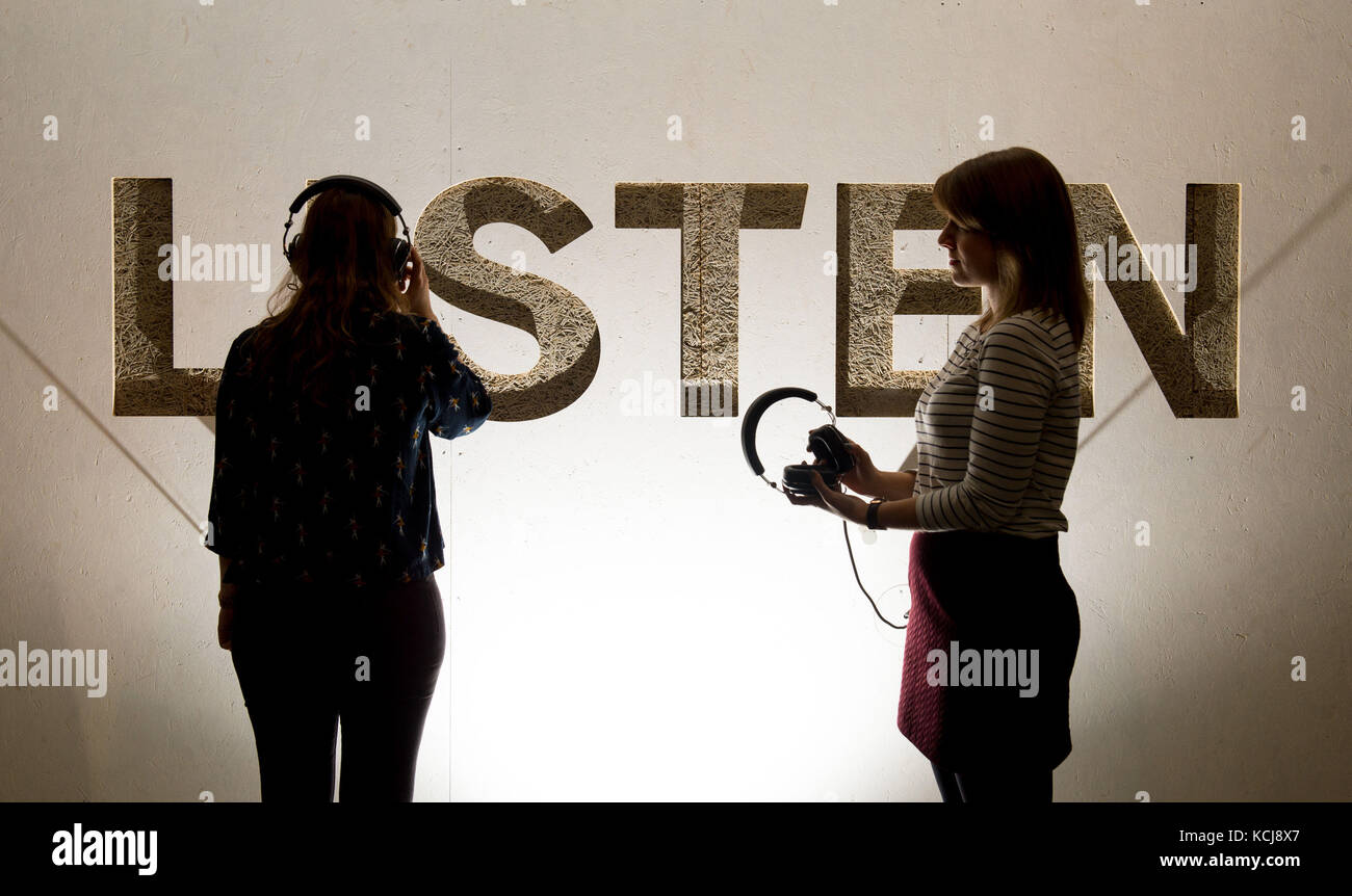 Visitors listen to recordings from the British Library sound archive