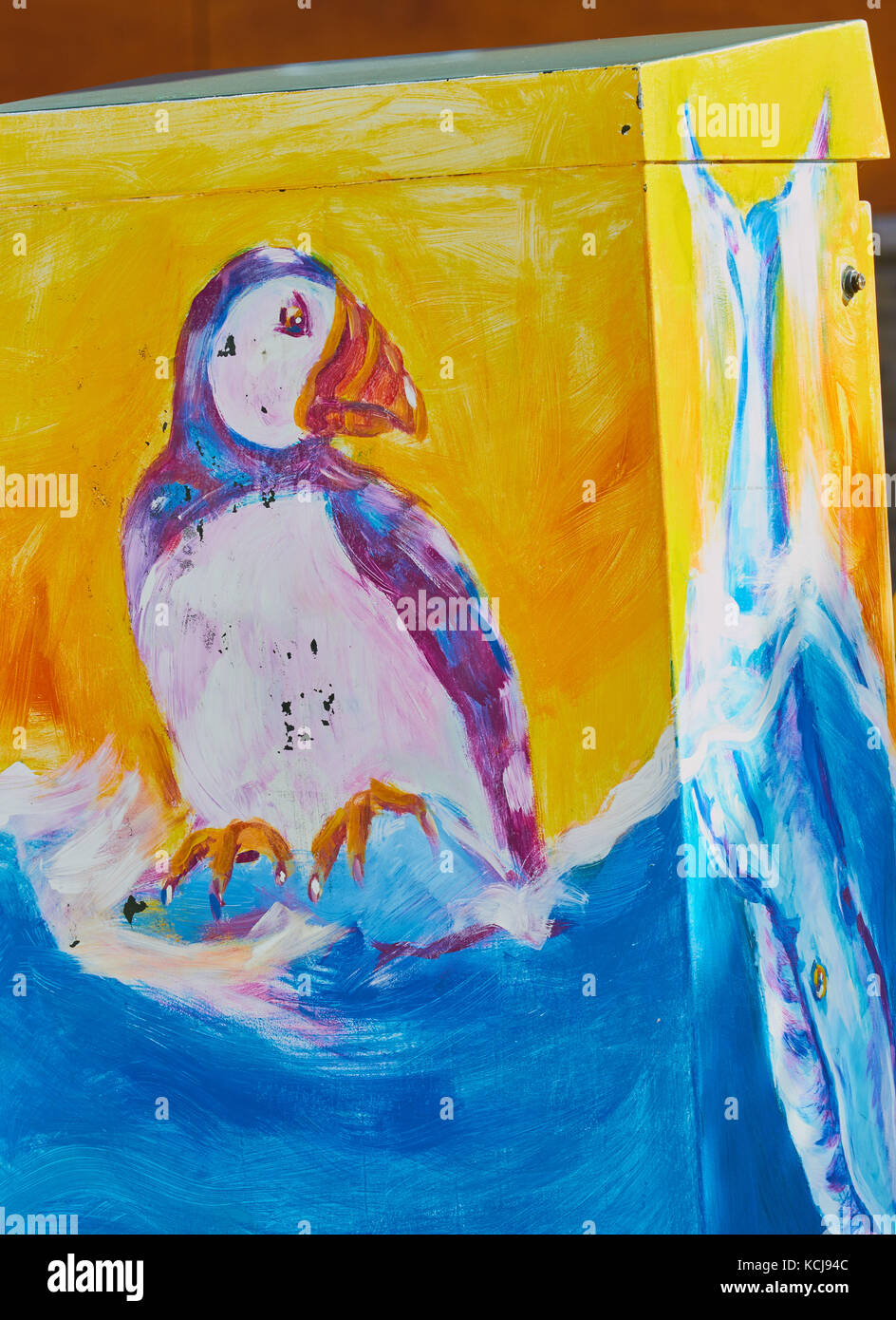Power transformer box decorated with painting of a puffin, St John's, Newfoundland, Canada Stock Photo