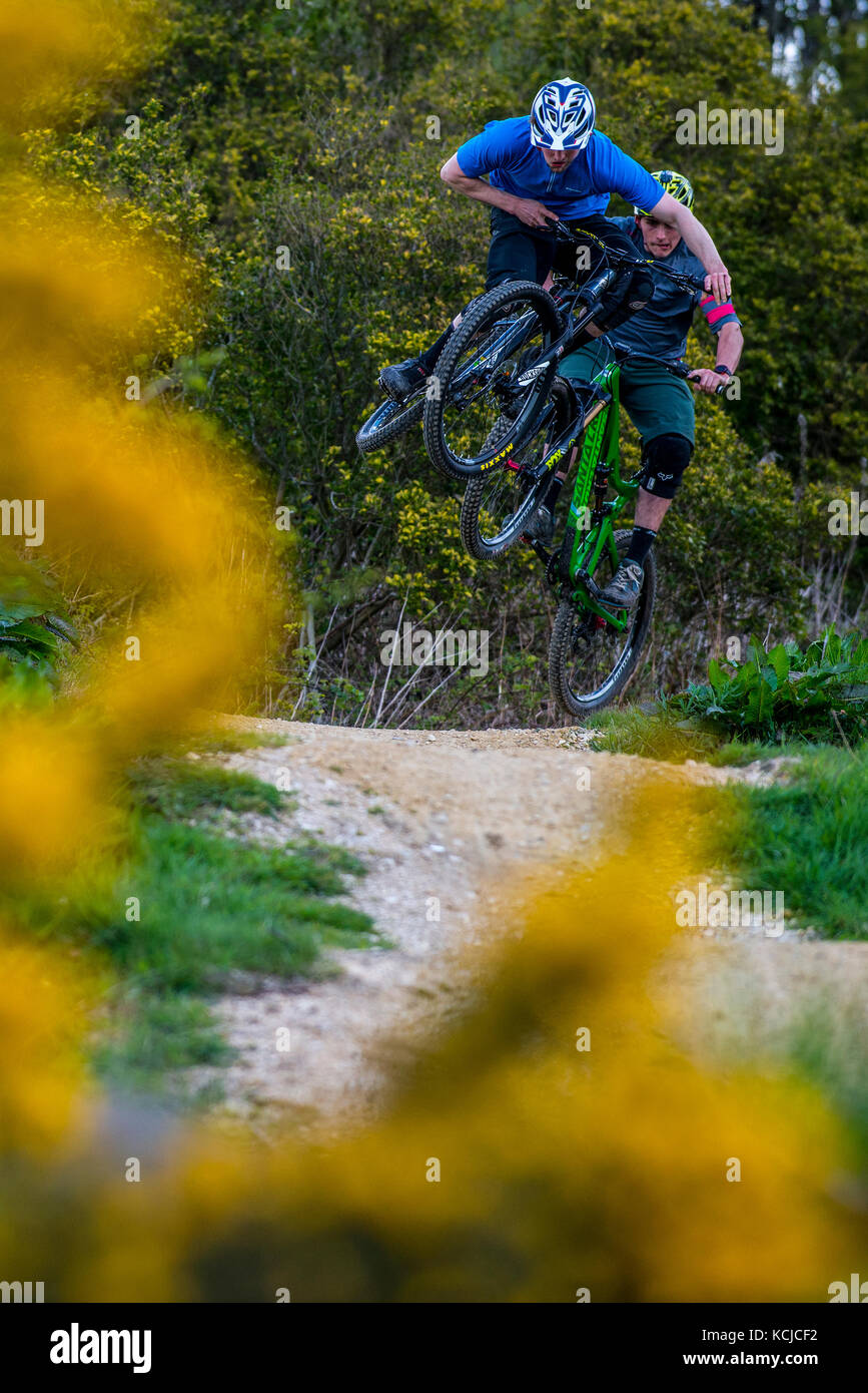 Two mountain bikers ride the trails at Parkwood Springs in Sheffield city centre. Stock Photo