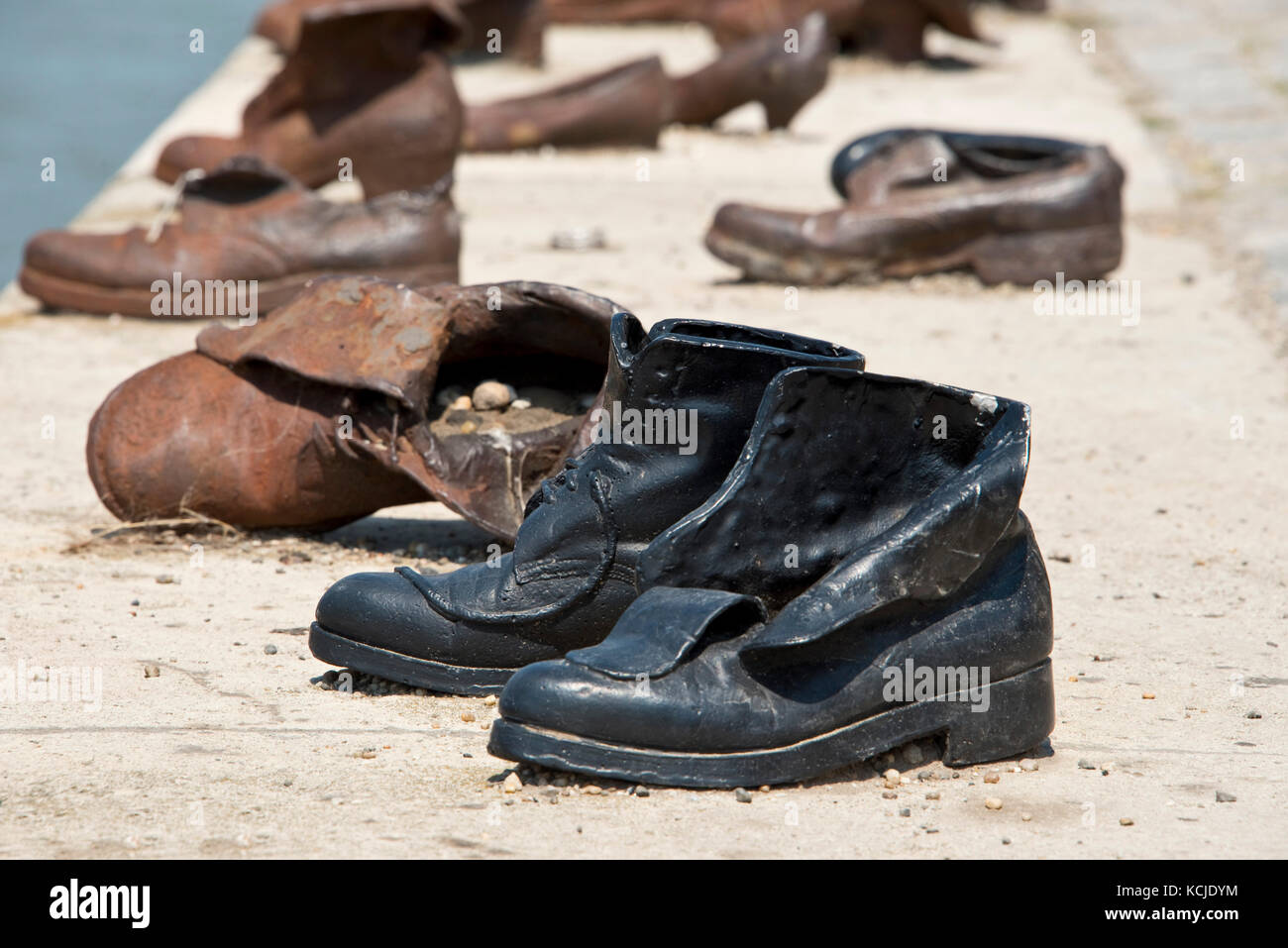 The Shoes on the Danube Bank memorial in Budapest on a sunny day. Stock Photo
