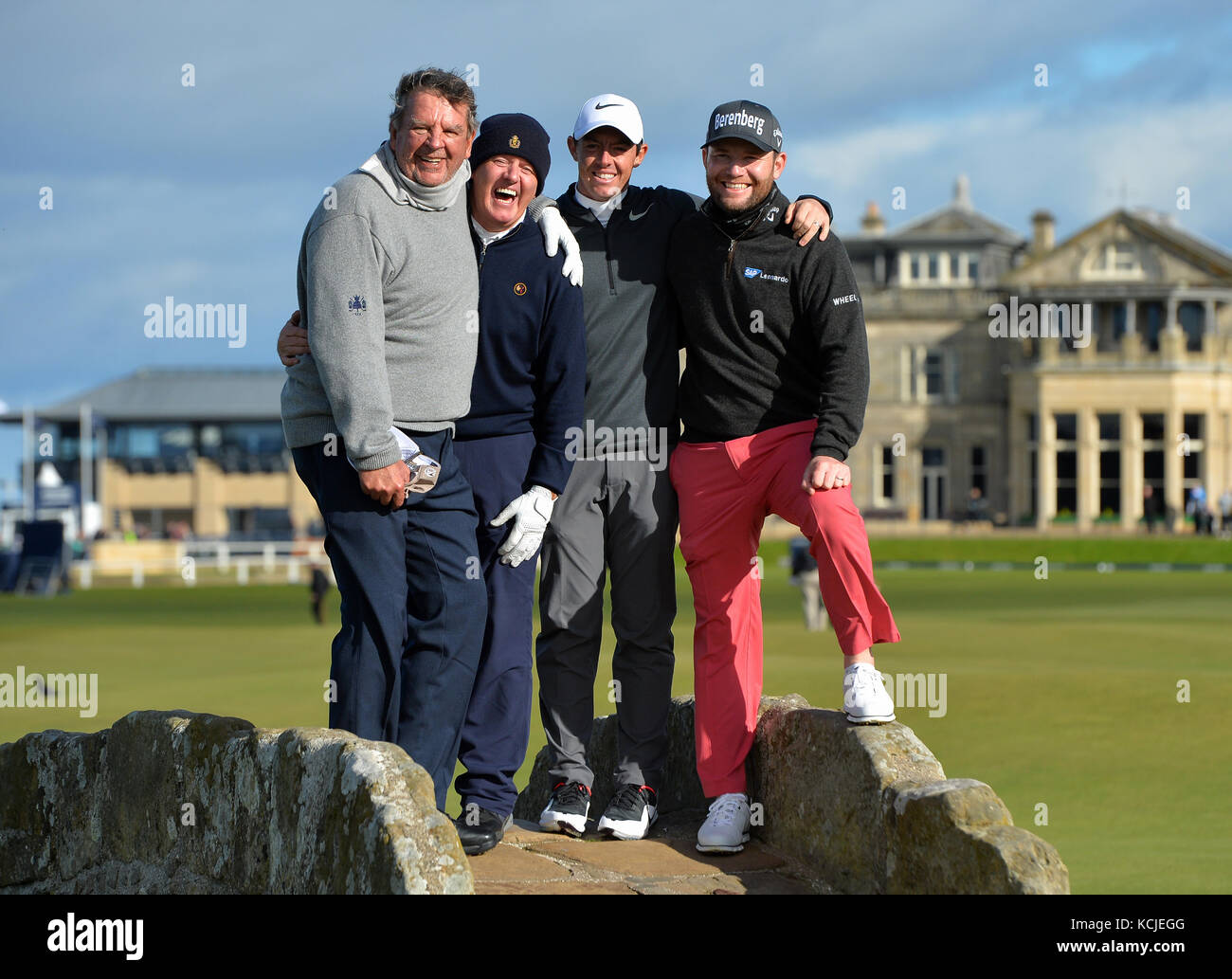 (left-right) Johann Rupert, Jerry McIlroy, Rory McIlroy and Branden Grace on the Swilken Bridge during day one of the Alfred Dunhill Links Championship at St Andrews. Stock Photo