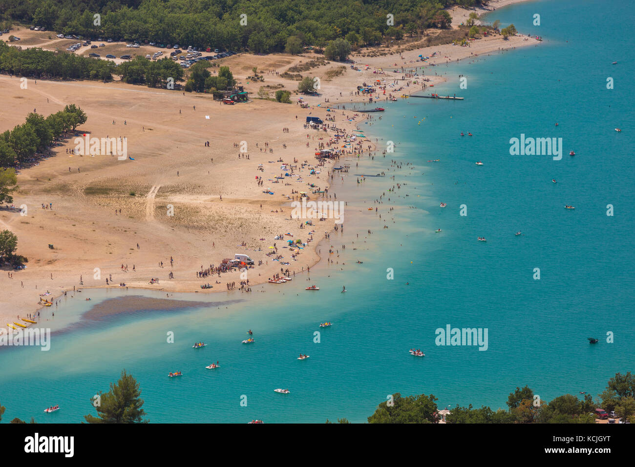 LAKE OF SAINTE-CROIX, PROVENCE, FRANCE - Aerial of people on beach and in boats at man-made lake, lac de Sainte-Croix. Stock Photo
