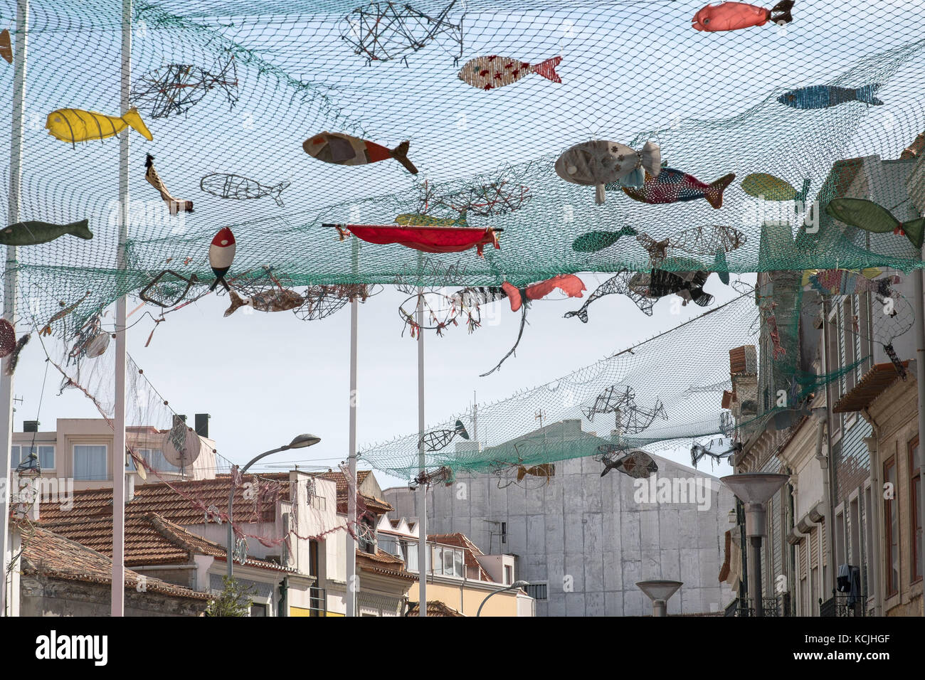 https://c8.alamy.com/comp/KCJHGF/street-decoration-with-fishes-in-a-fishing-net-KCJHGF.jpg