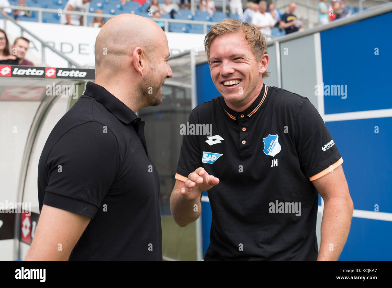 Sinsheim, GER - August 05, TSG Hoffenheim - FC Bologna, Saisoneröffnung, Rhein-Neckar-Arena . Im Bild: Direktor Profifussball Alexander Rosen (Hoffenheim) und Cheftrainer Julian Nagelsmann (TSG Hoffenheim)  . (Photo by Ulrich Roth / ulrich-roth.de) +++ Foto ist honorarpflichtig +++ Stock Photo