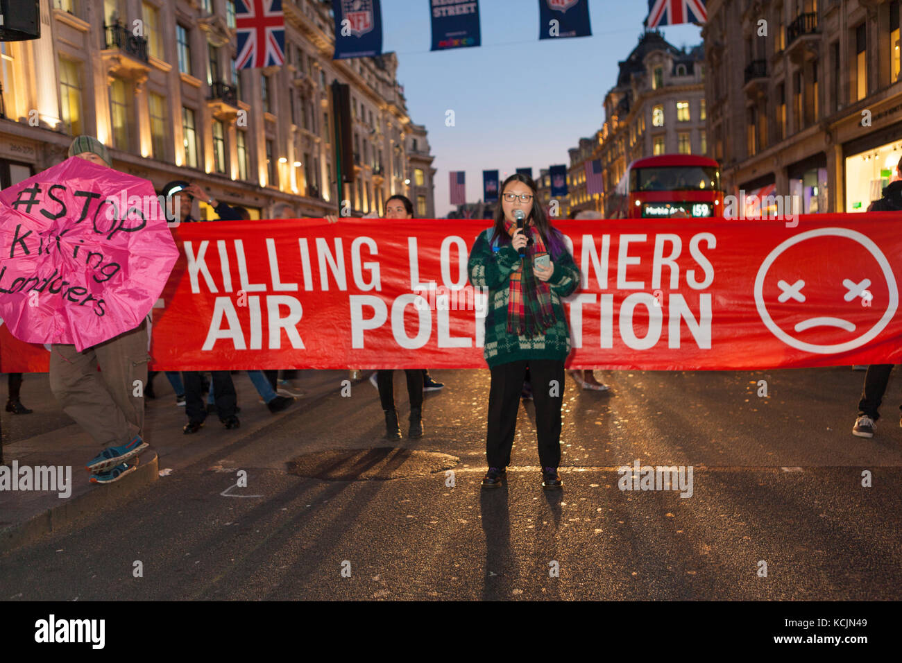 London, UK. 5th Oct, 2017. Stop Killing Londoners Protest: Oxford Circus, London UK. 5th October, 2017. Stop Killing Londoners - Campaigners stage 10 minute road block in Oxford Circus to demand urgent action on pollution on London’s roads. Part of an ongoing campaign of peaceful protests calling on Mayor Sadiq Khan to take decisive action against the dangerous levels of pollution, which causes thousands of deaths each year. Credit: Steve Parkins/Alamy Live News Stock Photo