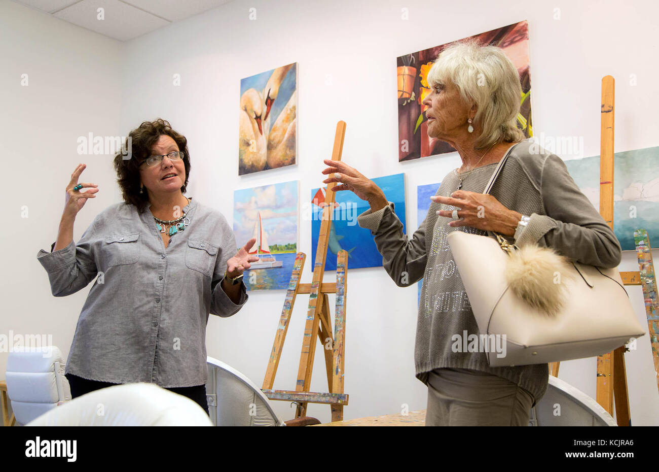 Palm Beach Gardens, Florida, USA. 5th Oct, 2017. Myrtha Barris (left) gives a tour of her art school to Princess Birgitta of Sweden. Barris moved the Academy of Fine Art out of the Crystal Tree Plaza into the flourishing arts district on Park Avenue in Lake Park, where it's having a royal grand opening Friday: Princess Birgitta of Sweden will be the guest of honor. Some small businesses left Crystal Tree Plaza because of high rents for redevelopment of the plaza. Credit: Allen Eyestone/The Palm Beach Post/ZUMA Wire/Alamy Live News Stock Photo