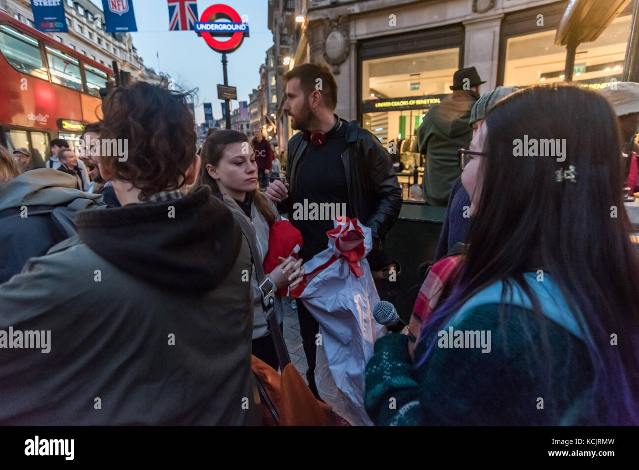 London, UK. 5th October 2017. Campaigners hold folded banners ready to