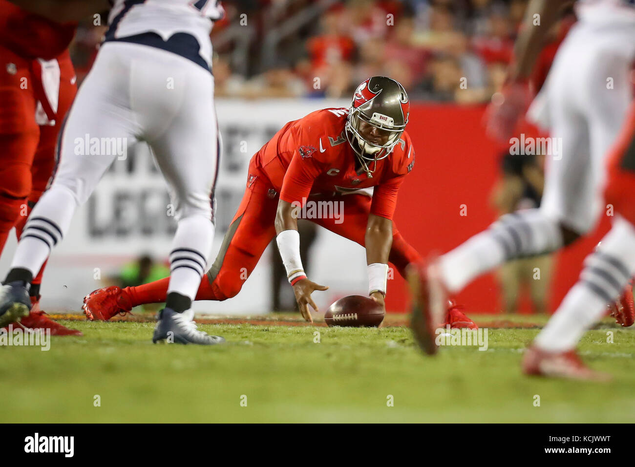 Tampa, Florida, USA. 5th Oct, 2017. MONICA HERNDON | Times.Tampa Bay Buccaneers quarterback Jameis Winston (3) recovers a bobbled snap, passes incomplete in the fourth quarter of the Tampa Bay Buccaneers game against the New England Patriots on October 5, 2017 at Raymond James Stadium in Tampa, Fla. The New England Patriots beat the Tampa Bay Buccaneers 19-14. Credit: Monica Herndon/Tampa Bay Times/ZUMA Wire/Alamy Live News Stock Photo