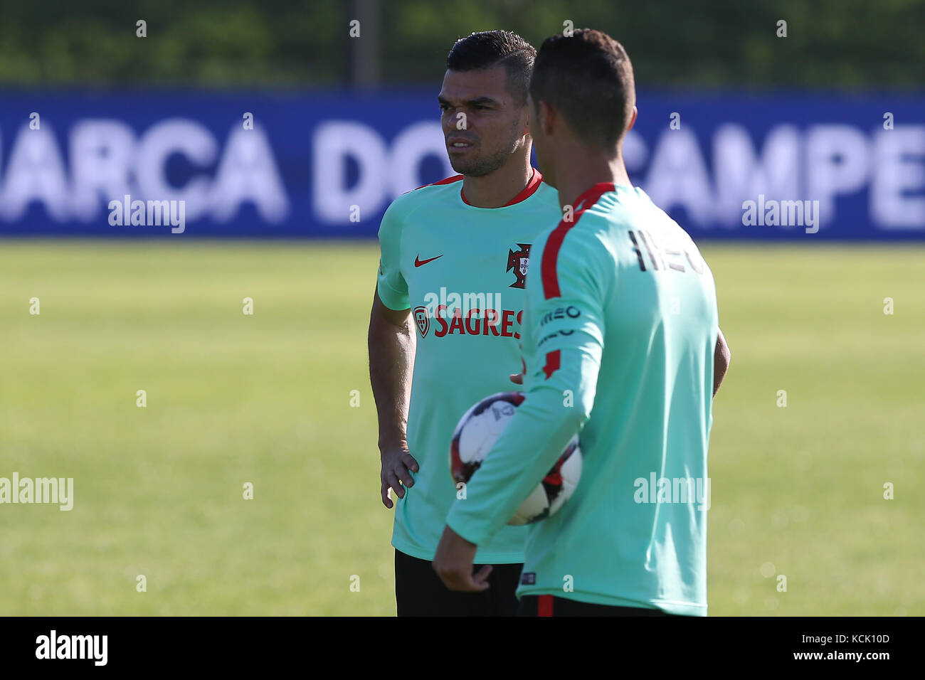 Oeiras, Portugal. 05th Oct, 2017. Portugal defender Pepe talks with Portugal forward Cristiano Ronaldo during National Team Training session before the match between Portugal and Andorra at City Football in Oeiras, Lisbon on October 5, 2017. ( Credit: Bruno Barros/Alamy Live News Stock Photo