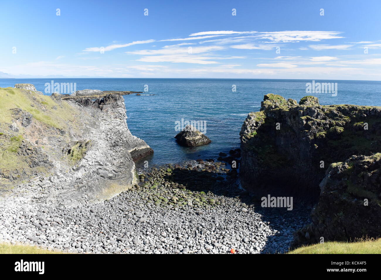 Shoreline and cliffs of basalt rock at Arnarstapi nature reserve seen ...