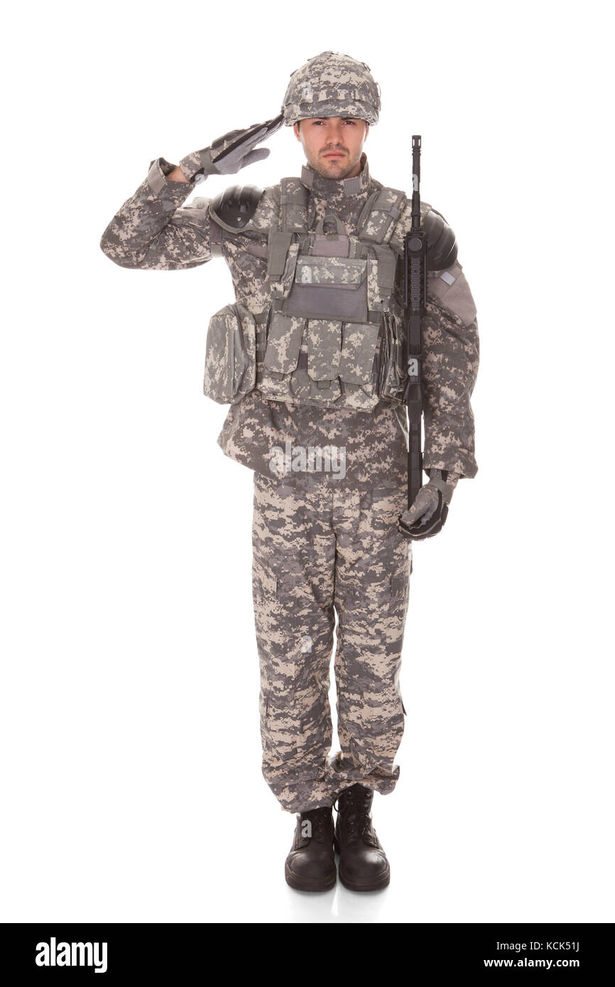 Man In Military Uniform Saluting Over White Background Stock Photo - Alamy