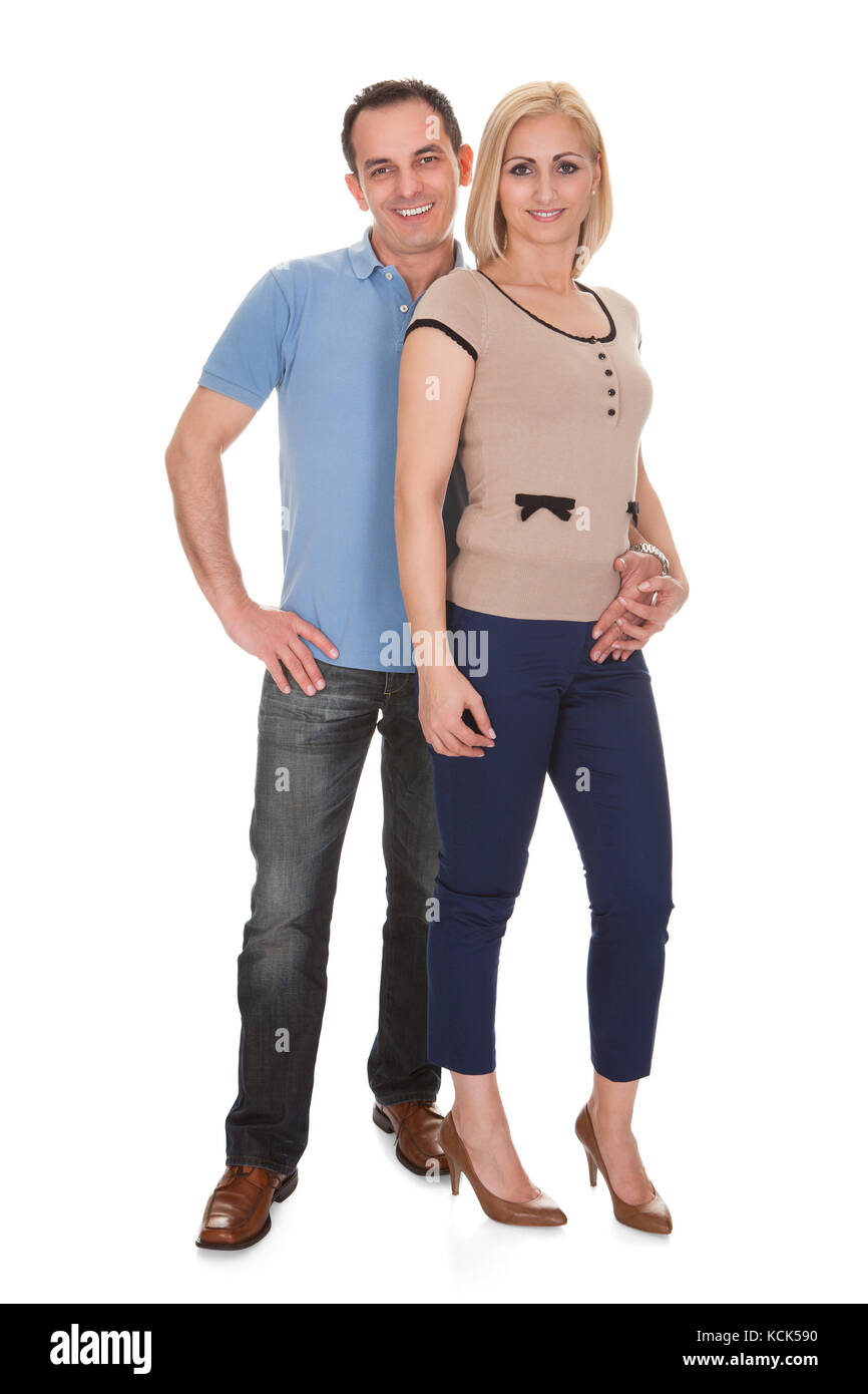 Portrait Of Happy Couple On White Background Stock Photo - Alamy
