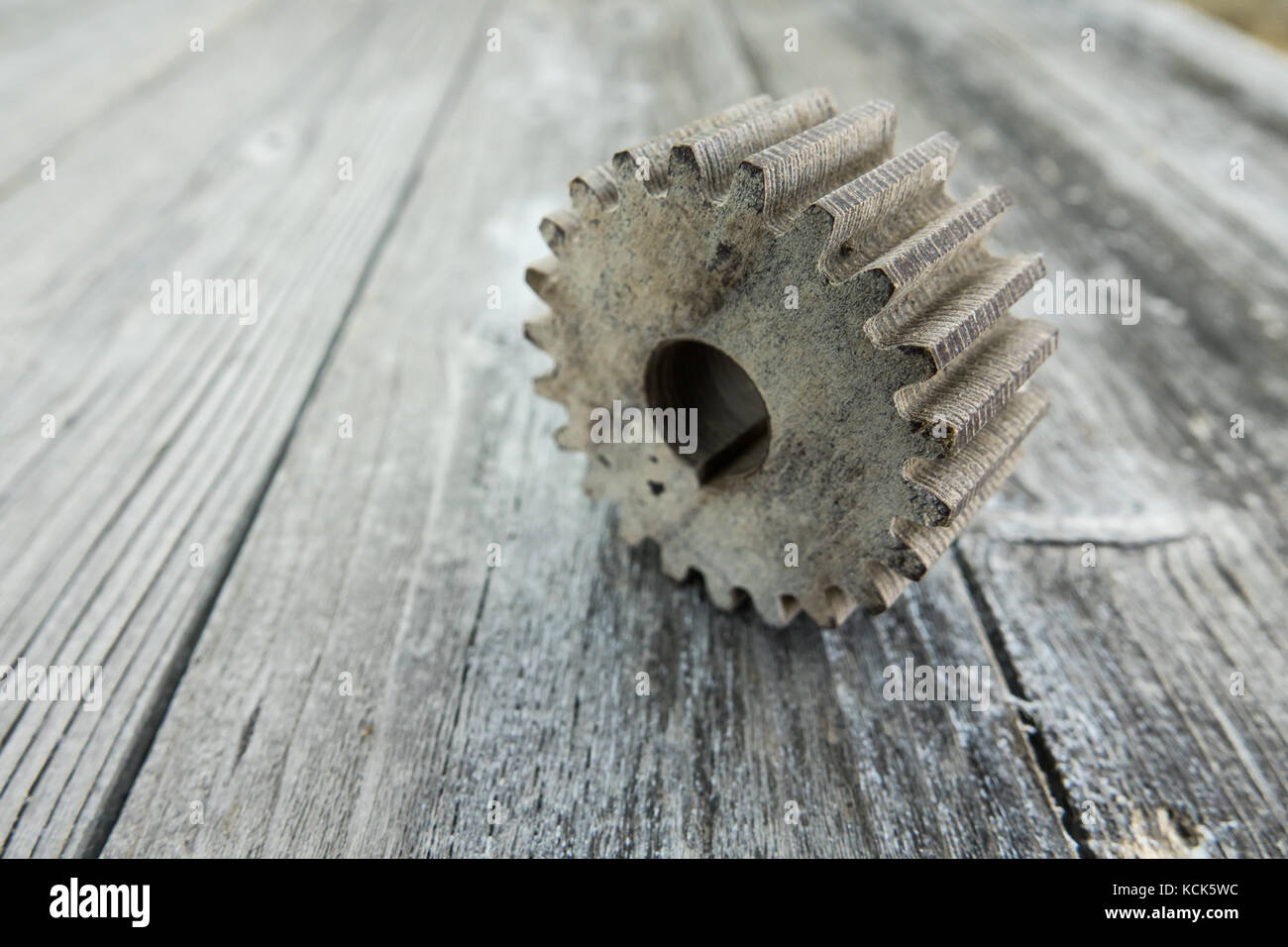 Wooden toothed wheels. The concept of creative and logical thinking