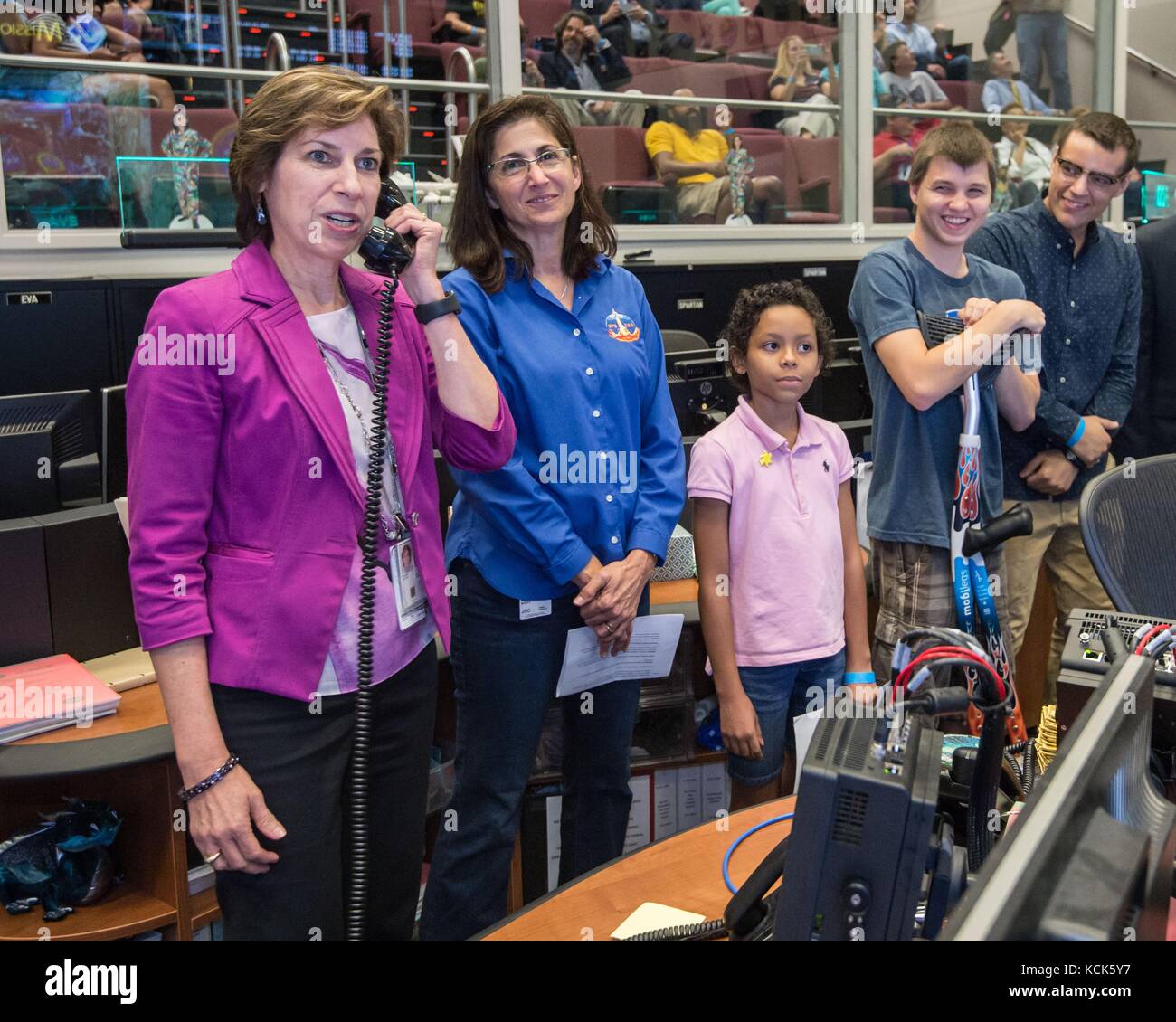 NASA Johnson Space Center Director Ellen Ochoa (left) and retired NASA astronaut Nicole Stott help young patients from the MD Anderson Childrens Cancer Hospital speak to NASA astronaut Kate Rubins aboard the International Space Station September 16, 2016 in Houston, Texas.   (photo by Robert Markowitz  via Planetpix) Stock Photo