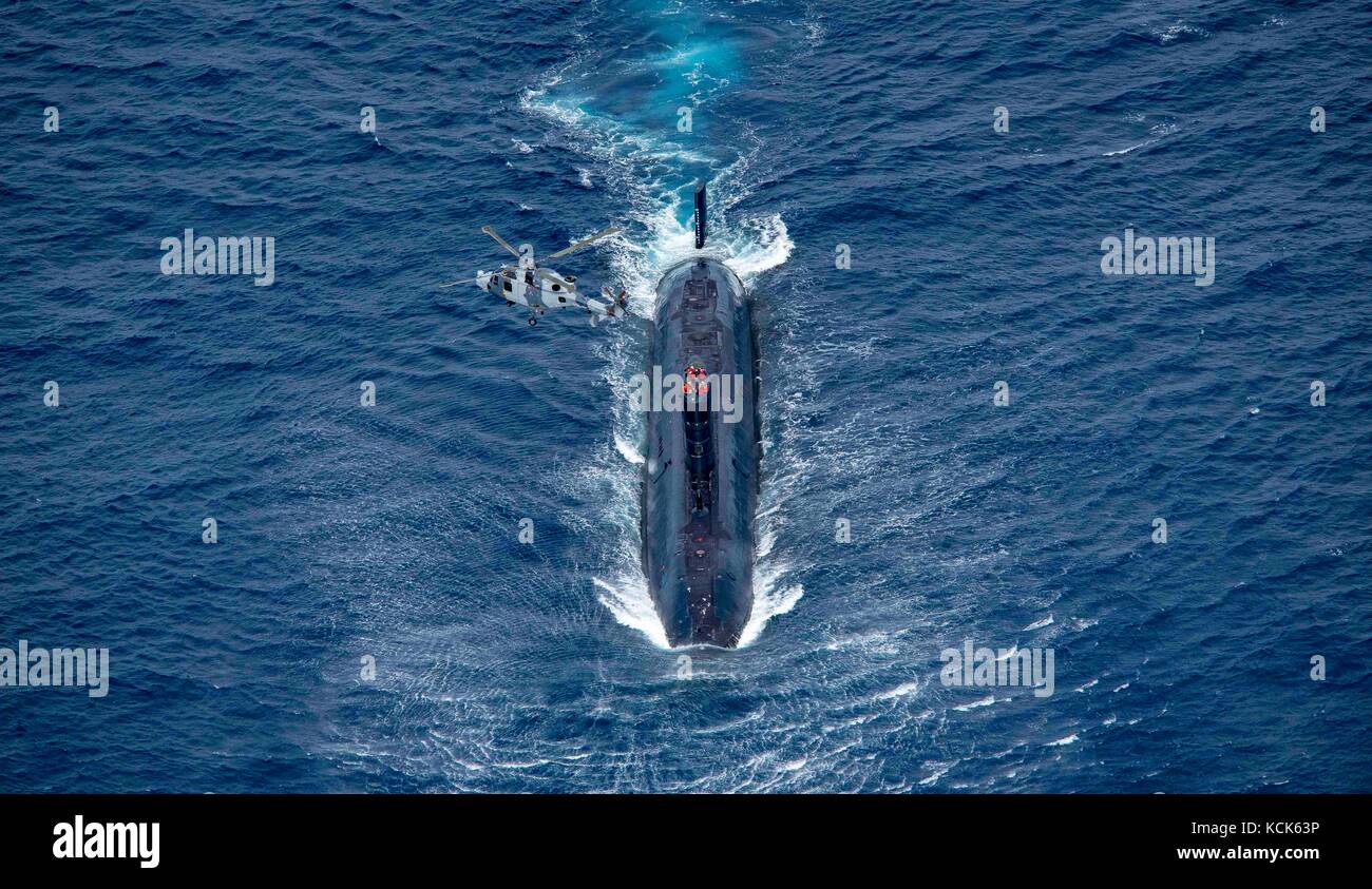 The British Royal Navy Trafalgar-class fleet submarine HMS Trenchant steams underway during exercise Saxon Warrior August 5, 2017 in the Atlantic Ocean.  (photo by Zachary Wickline  via Planetpix) Stock Photo