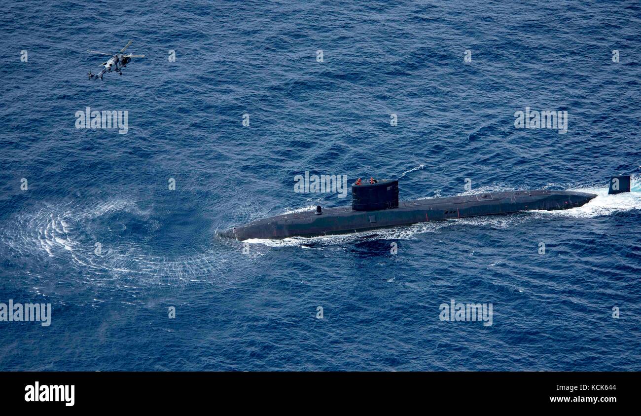 The British Royal Navy Trafalgar-class fleet submarine HMS Trenchant steams underway during exercise Saxon Warrior August 5, 2017 in the Atlantic Ocean.  (photo by Zachary Wickline  via Planetpix) Stock Photo