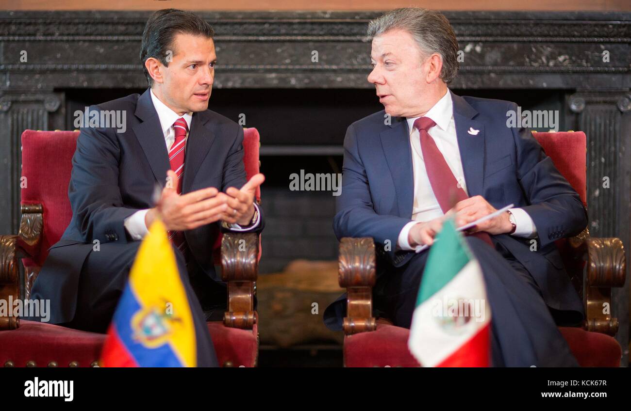 Mexican President Enrique Pena Nieto (left) meets with Colombian President Juan Manuel Santos during a visit to the Narino Presidential Palace October 27, 2016 in Bogota, Colombia.  (photo by Mexican Presidency Photo  via Planetpix) Stock Photo