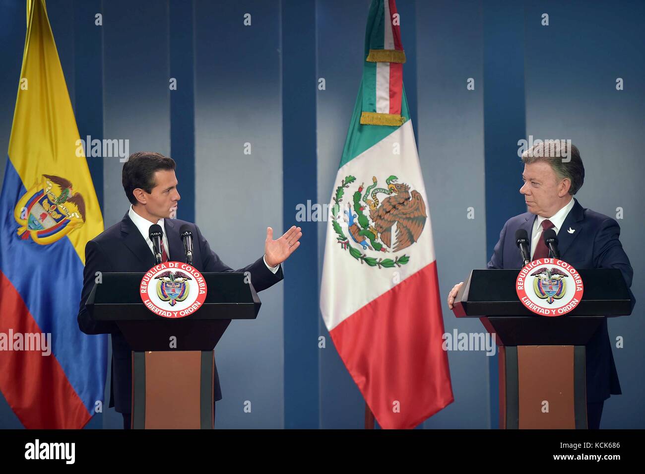 Mexican President Enrique Pena Nieto (left) and Colombian President Juan Manuel Santos speak during a joint press conference at the Narino Presidential Palace October 27, 2016 in Bogota, Colombia.  (photo by Mexican Presidency Photo  via Planetpix) Stock Photo