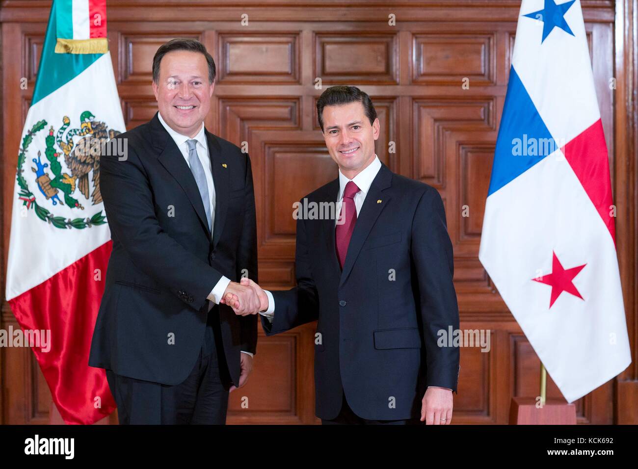 Panamanian President Juan Carlos Varela Rodriguez (left) meets with Mexican President Enrique Pena Nieto during a visit to the National Palace November 14, 2016 in Mexico City, Mexico.  (photo by Mexican Presidency Photo  via Planetpix) Stock Photo