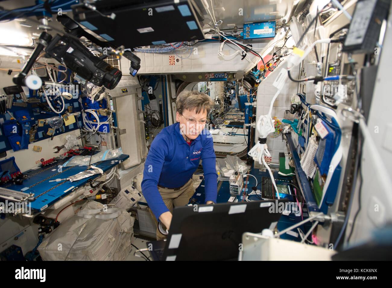 NASA International Space Station Expedition 51 prime crew member American astronaut Peggy Whitson works on an experiment inside the Harmony Module June 28, 2017 in Earth orbit.   (photo by NASA Photo  via Planetpix) Stock Photo