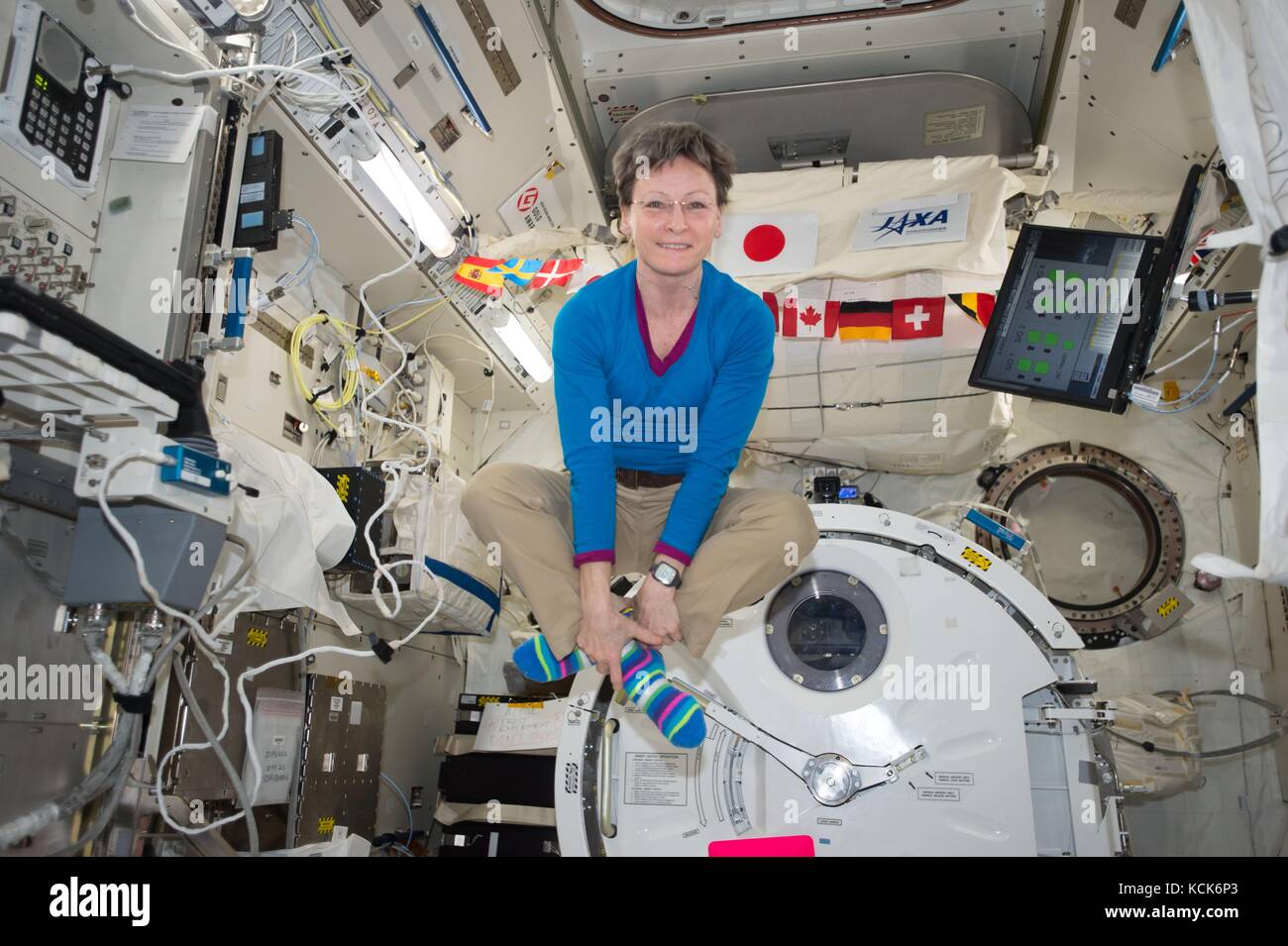 NASA International Space Station Expedition 51 prime crew member American astronaut Peggy Whitson floats inside the Japanese Kibo Laboratory Module June 22, 2017 in Earth orbit.   (photo by NASA Photo  via Planetpix) Stock Photo