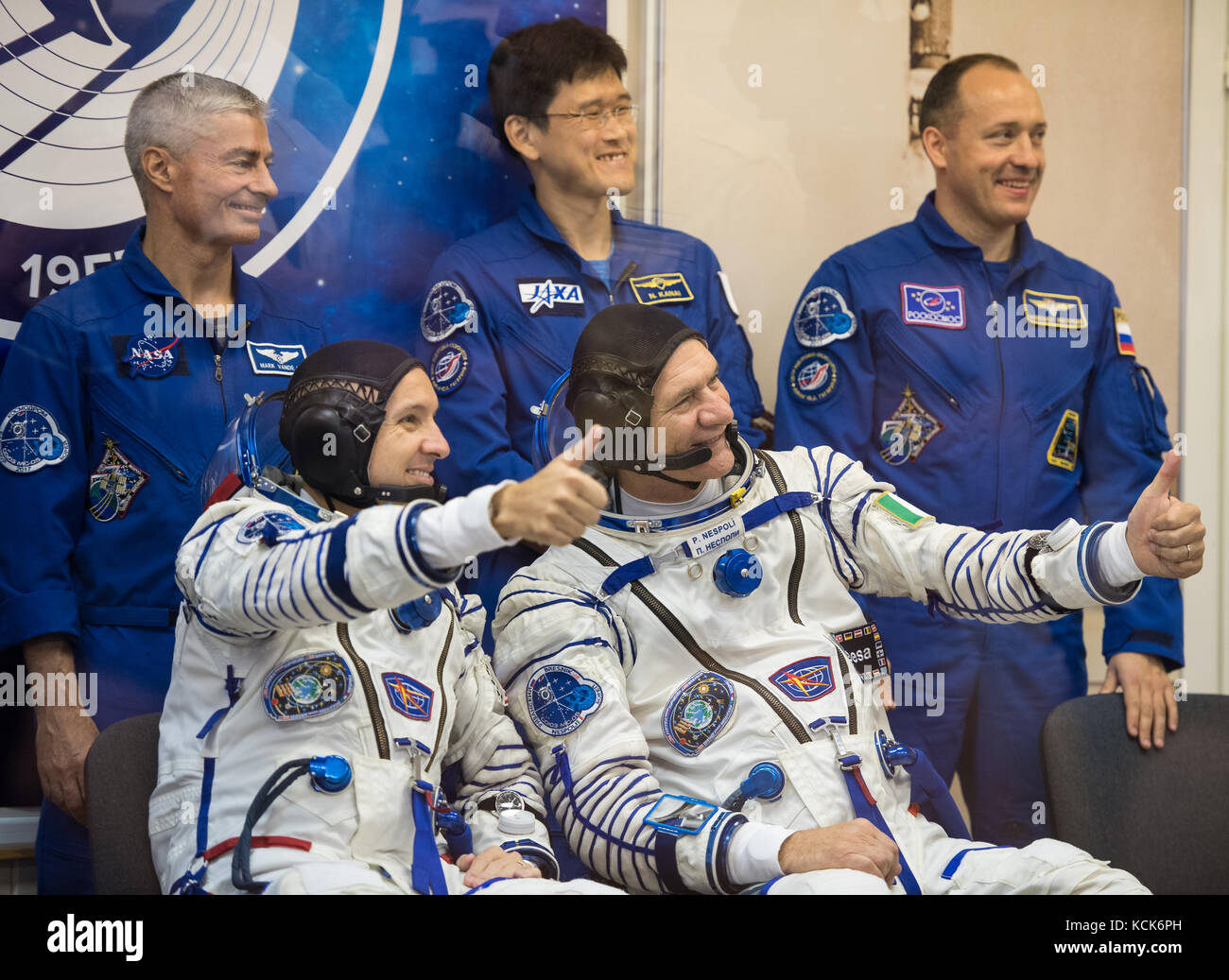 NASA International Space Station Expedition 52 prime crew members American astronaut Randy Bresnik (left) and Italian astronaut Paolo Nespoli of the European Space Agency give a thumbs-up as they wait to have their Sokol spacesuit pressure checked in preparation for the Soyuz MS-05 launch at the Baikonur Cosmodrome July 28, 2017 in Baikonur, Kazakhstan.  (photo by Joel Kowsky  via Planetpix) Stock Photo