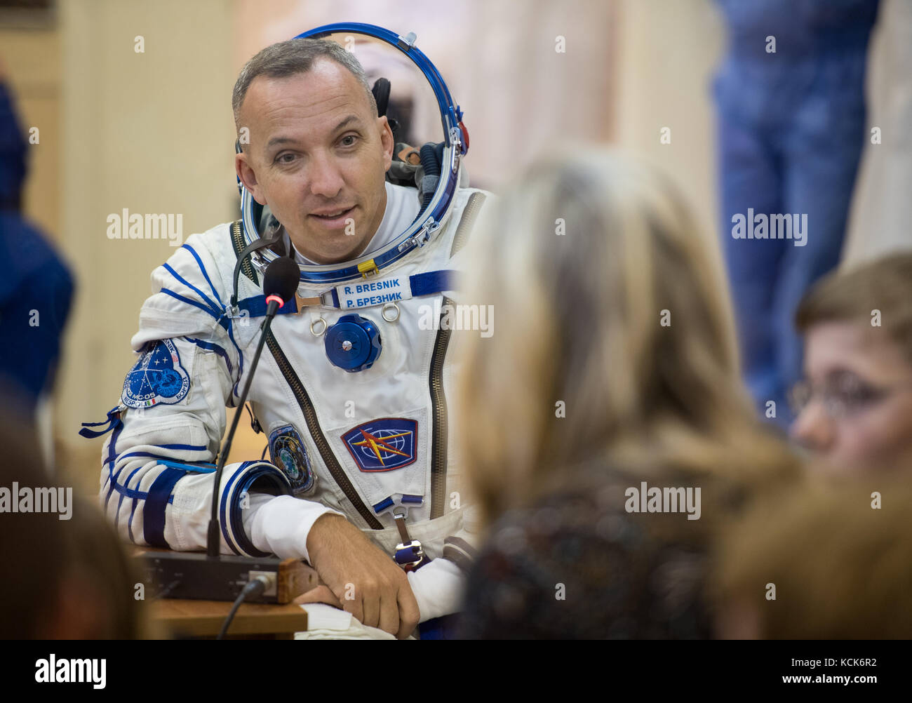 NASA International Space Station Expedition 52 prime crew member American astronaut Randy Bresnik talks to family and friends after having his Sokol spacesuit pressure checked in preparation for the Soyuz MS-05 launch at the Baikonur Cosmodrome July 28, 2017 in Baikonur, Kazakhstan.  (photo by Joel Kowsky  via Planetpix) Stock Photo