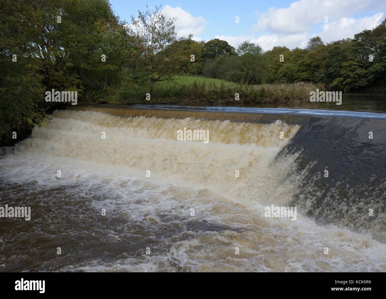 Weir on the river Irwell at burrs country park bury lancashire uk Stock Photo