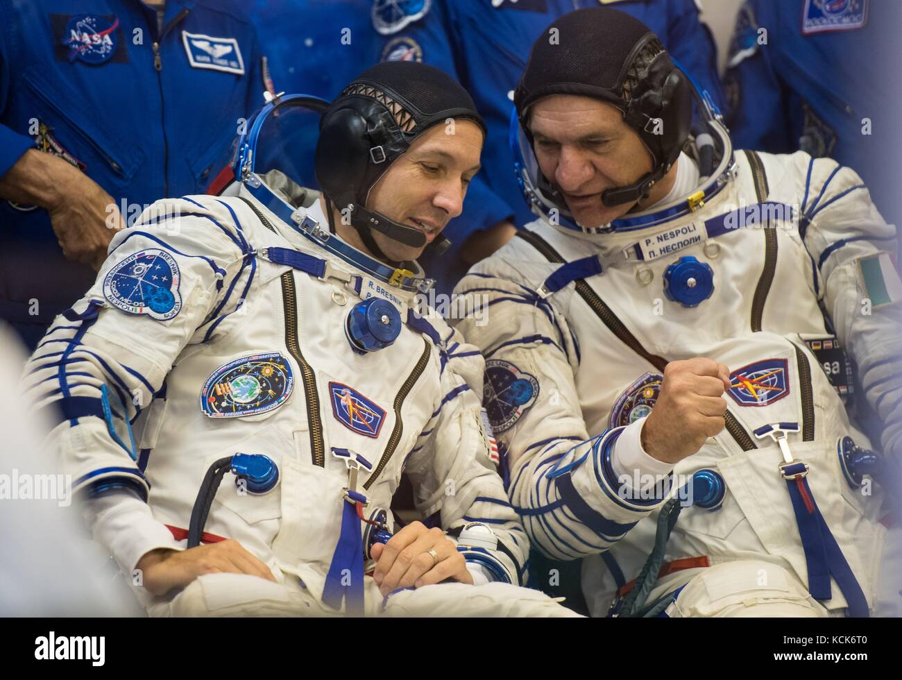 NASA International Space Station Expedition 52 prime crew members American astronaut Randy Bresnik (left) and Italian astronaut Paolo Nespoli of the European Space Agency wait to have their Sokol spacesuit pressure checked in preparation for the Soyuz MS-05 launch at the Baikonur Cosmodrome July 28, 2017 in Baikonur, Kazakhstan.  (photo by Joel Kowsky  via Planetpix) Stock Photo