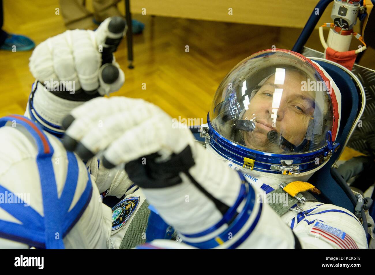 NASA International Space Station Expedition 52 prime crew member American astronaut Randy Bresnik has his Sokol spacesuit pressure checked in preparation for the Soyuz MS-05 launch at the Baikonur Cosmodrome July 28, 2017 in Baikonur, Kazakhstan.  (photo by Andrey Shelepin  via Planetpix) Stock Photo