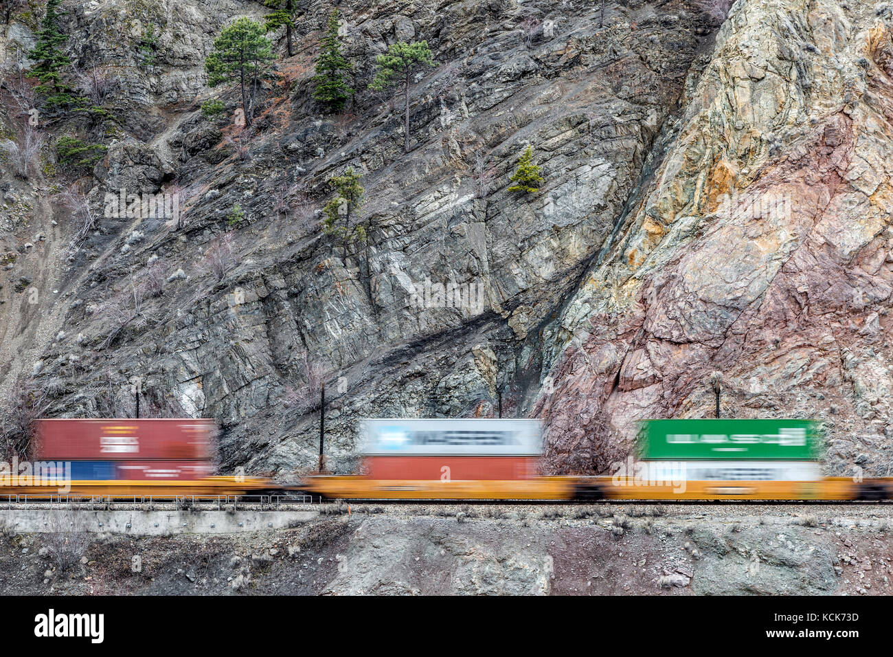 Canada, British Columbia, Fraser River Canyon, Via Rail line, Canadian Pacific Railway line, railway, freight train, motion, Stock Photo
