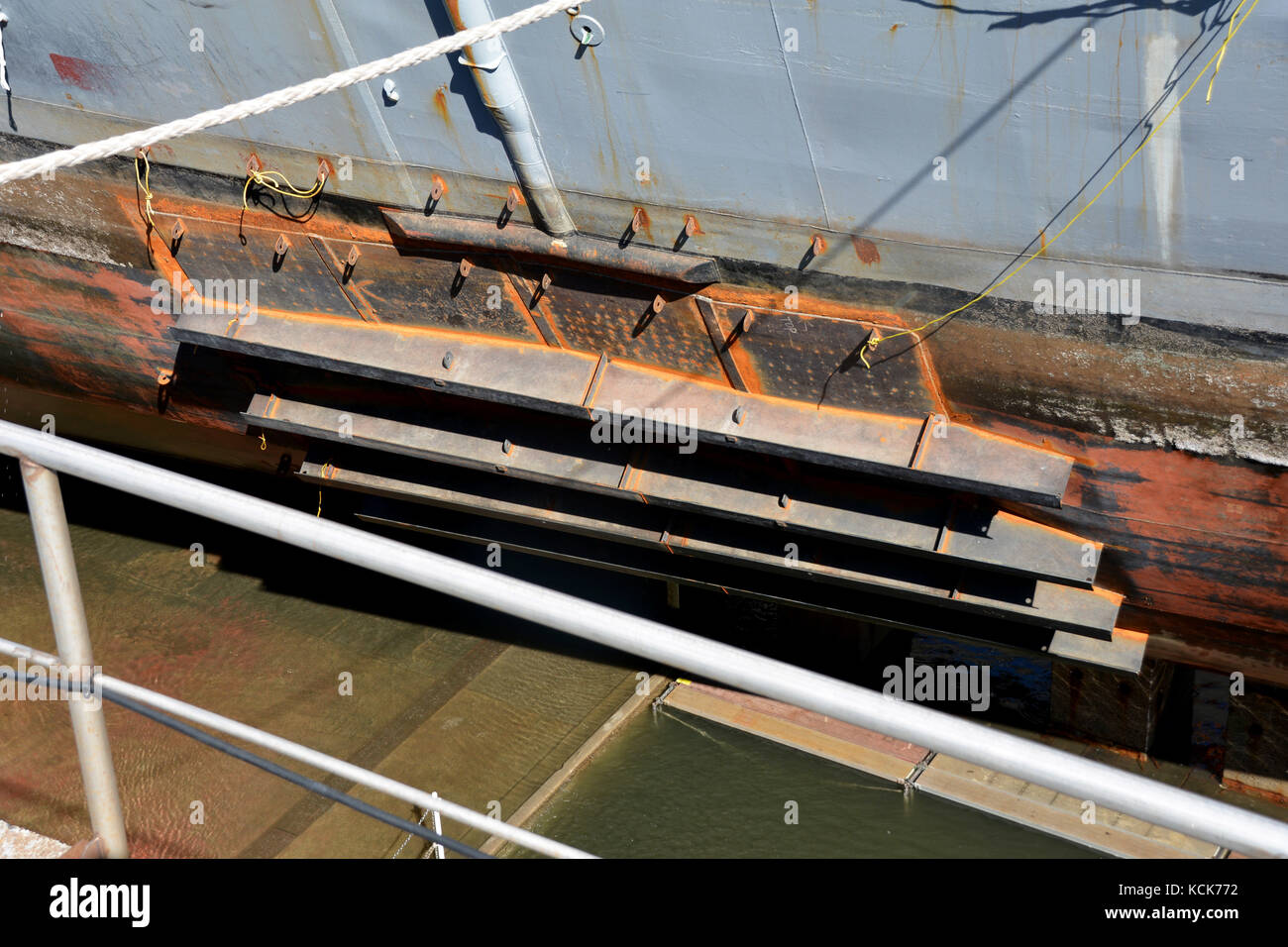 U.S. sailors repair the U.S. Navy Arleigh Burkeclass guidedmissile