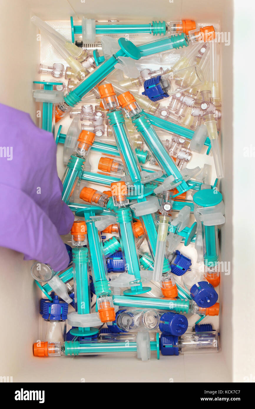 Big pile of plastic syringes in box Stock Photo Alamy