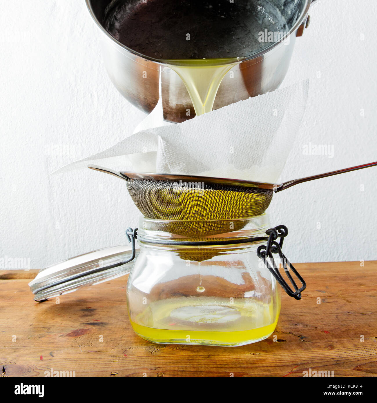 preparation of butter Ghee . filtering Stock Photo Alamy