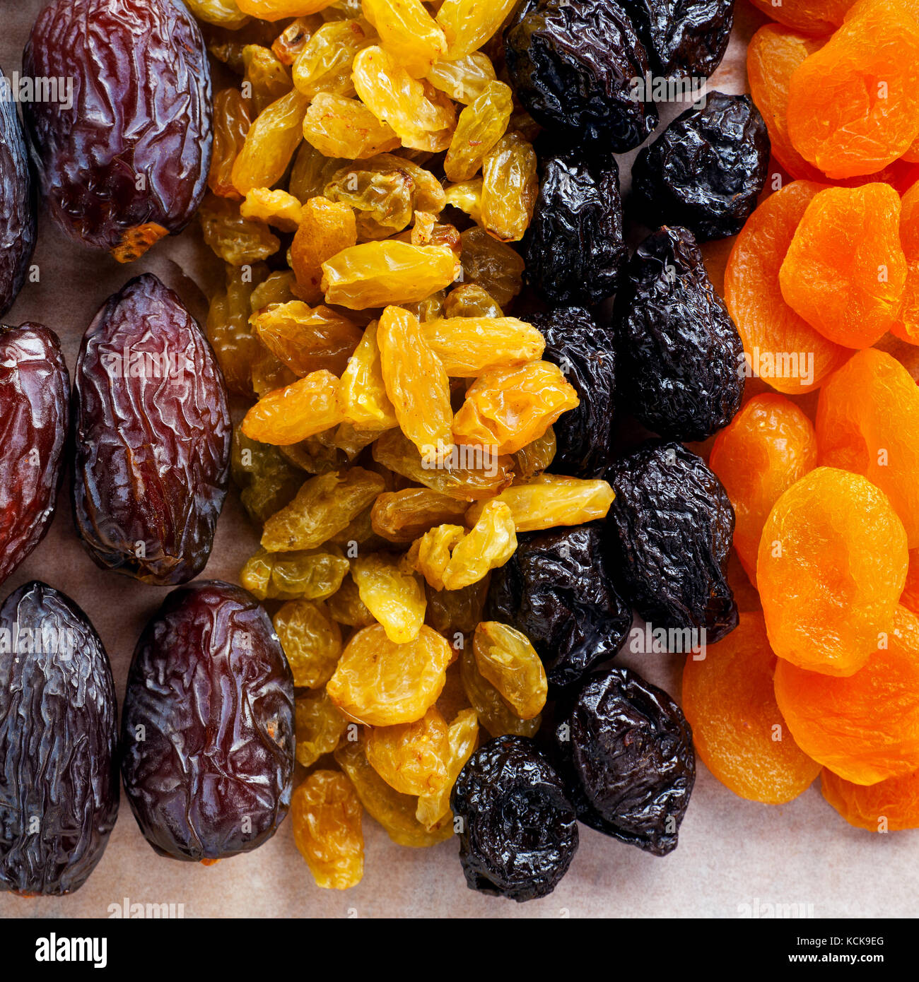 dried fruit mix on a wooden table Stock Photo - Alamy