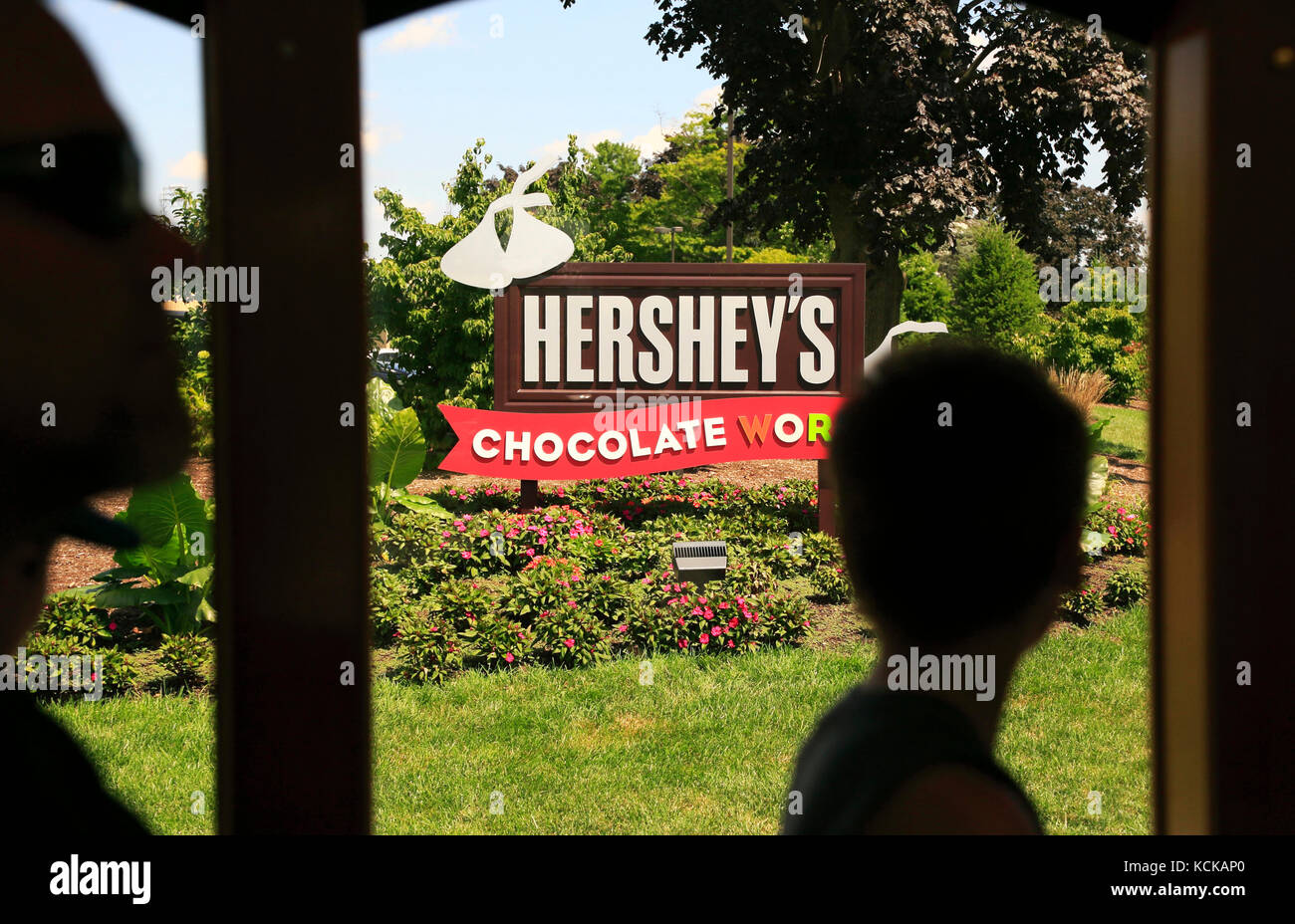 The view of the sign of Hershey Chocolate World from Hershey Trolley Works bus.Hershey.Pennsylvania.USA Stock Photo