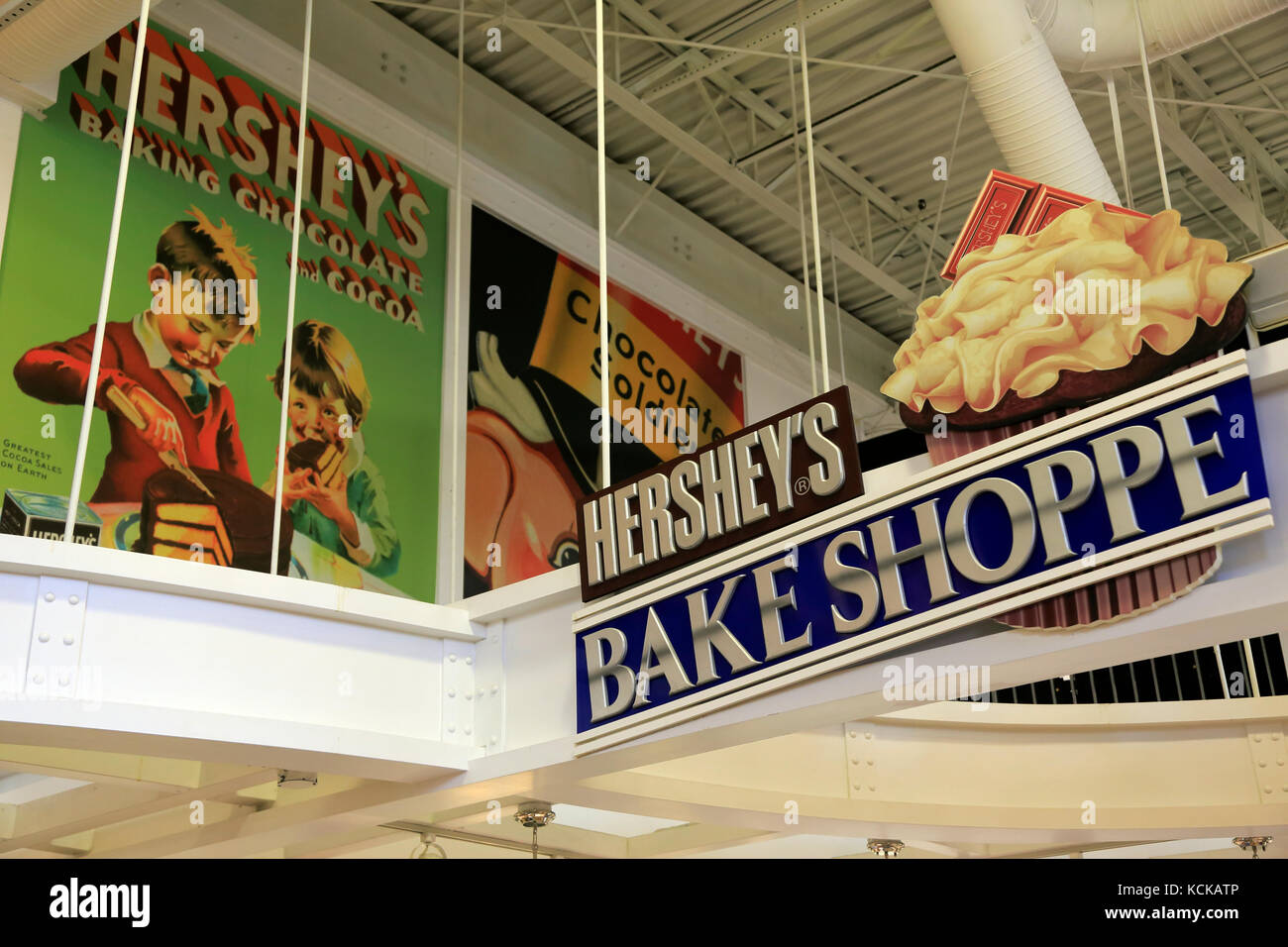 The sign of Hershey's Bake Shoppe with copies of historical posters of Hershey chocolate in Hershey's Chocolate World.Hershey.Pennsylvania.USA Stock Photo