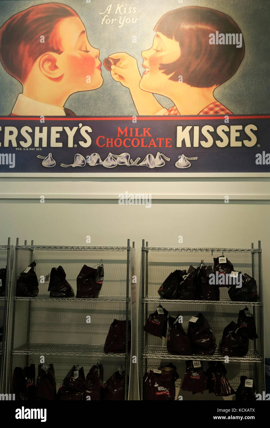 Reproduction of historical Hershey Chocolate posters decorated Create Your Own Candy Bar area in