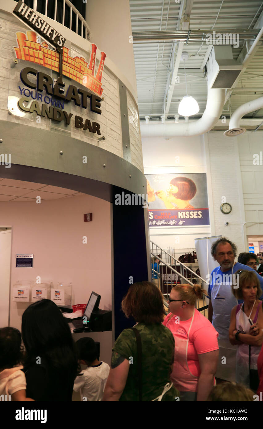 Visitors in Greatyour=own candy bar in Hershey's Chocolate World